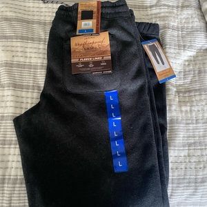 Weather proof, fleece lined, jogger, pants, size large.